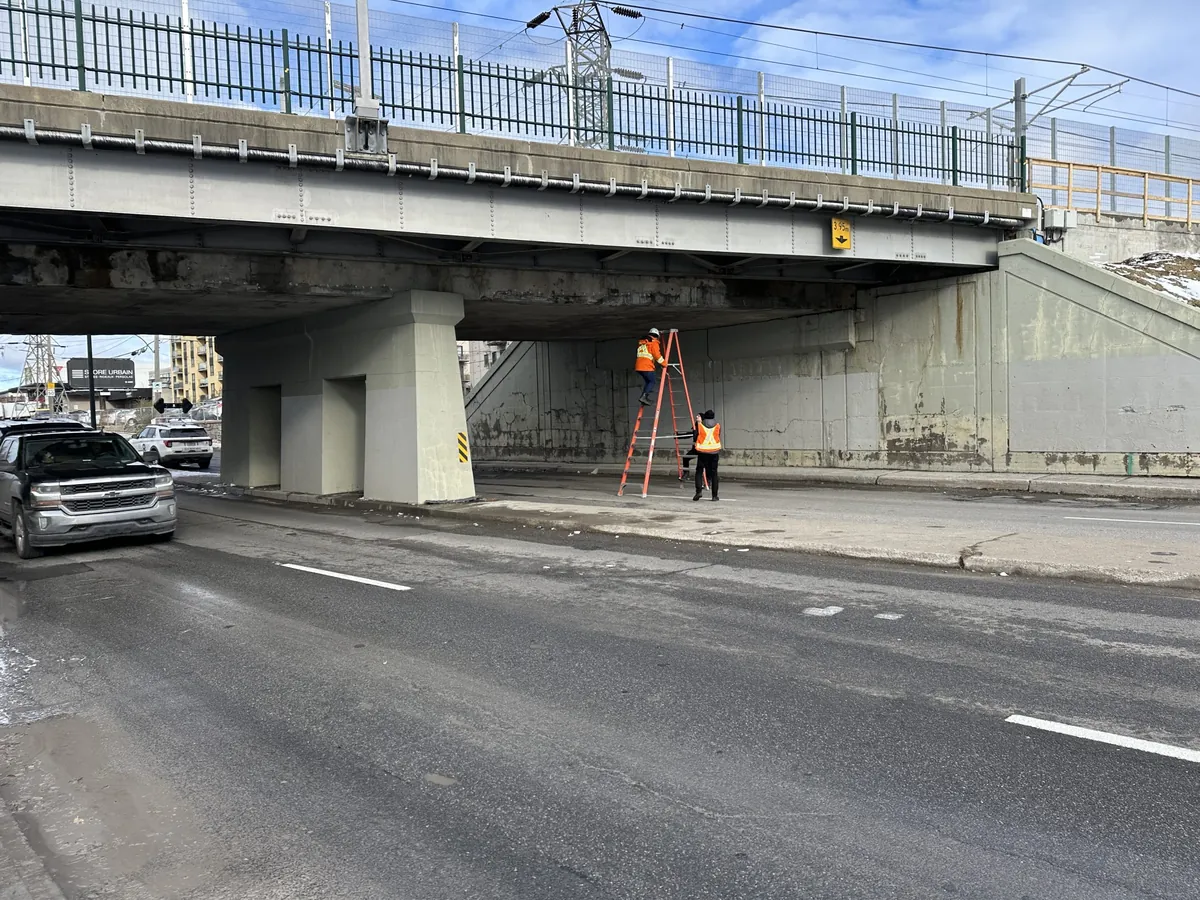 REM to install guardrail on overpass hit by truck